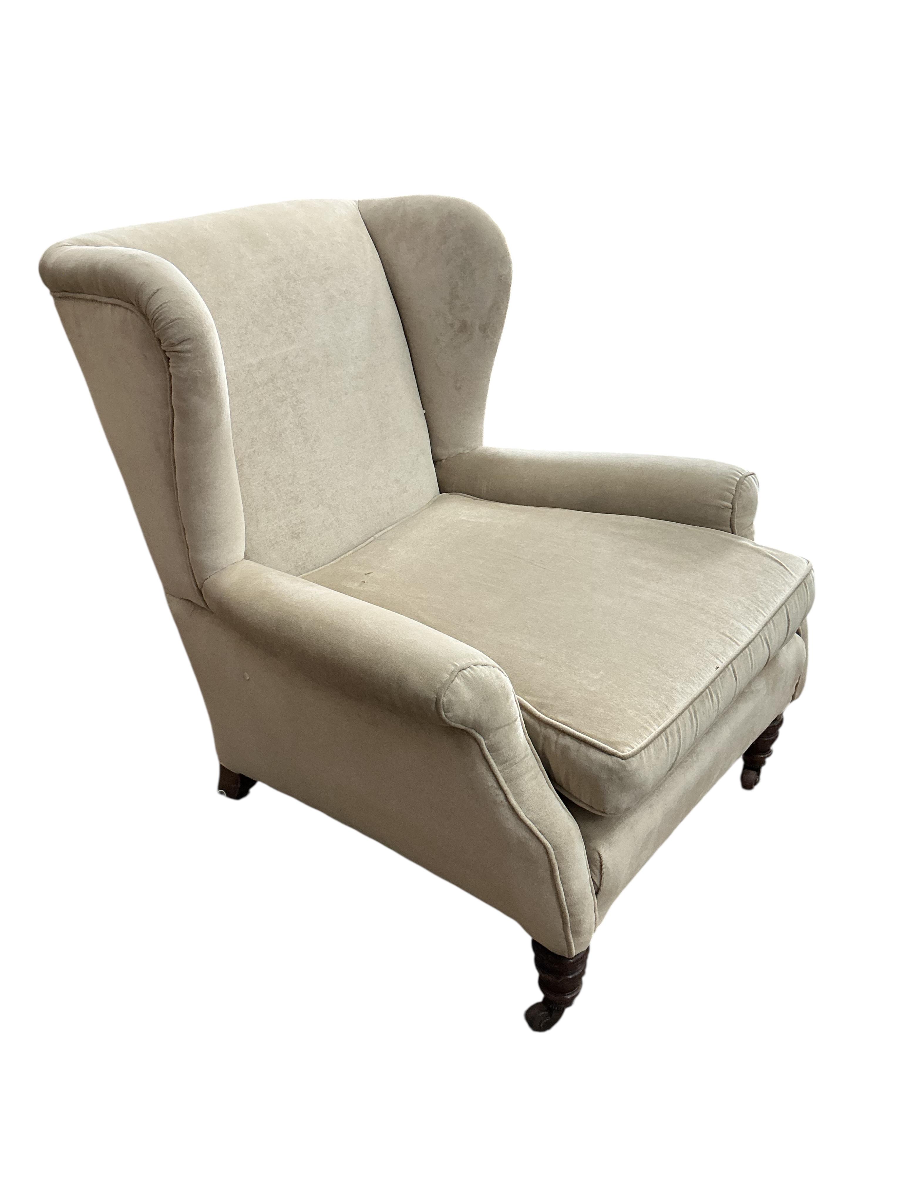 A Victorian upholstered wing armchair, width 80cm, depth 84cm, height 84cm